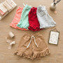 SHORT RUST. BEBA C/ VOLADOS LISO C/ CORD