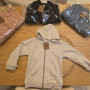 CAMPERA RUSTICA LISA CON CAPUCHA Y BOLSILLOS NIñO/A T:4 AL 10